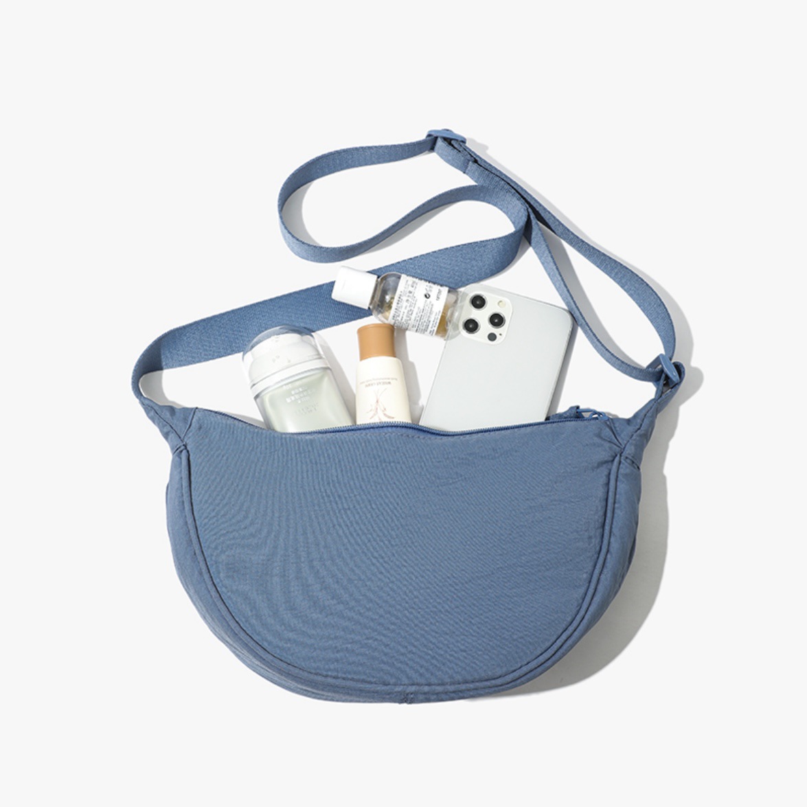 Sea blue Lightweight Nylon Crossbody Bag – Compact Saddle Style with Adjustable Strap for Everyday Use